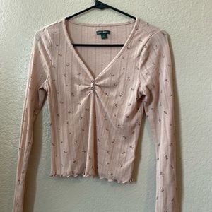 Pink top with white flowers